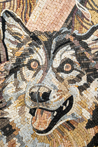 Vibrant mosaic artwork depicting a joyful wolf with expressive eyes and intricate stone detailing in earthy tones