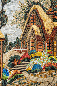 Intricate mosaic artwork depicting a charming cottage surrounded by vibrant flowers and lush greenery — a colorful blend of natural textures.