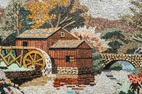Intricate mosaic artwork depicting a rustic wooden mill beside a tranquil stream with vibrant autumn foliage.