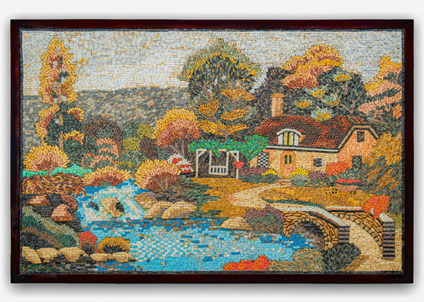 Vibrant mosaic artwork depicting a serene cottage scene with autumn foliage and a tranquil stream flowing under a stone bridge