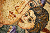 Intricate mosaic art featuring two intertwined faces — crafted with colorful stone tiles in a textured finish