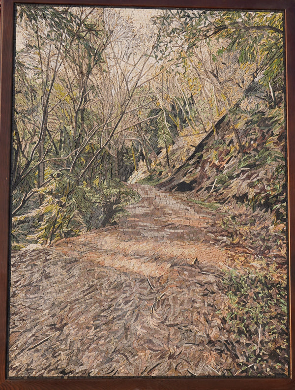 Intricate landscape puzzle depicting a serene forest path with textured pieces capturing natural light and earthy tones