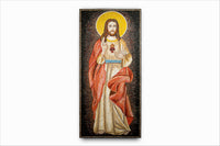 Intricate mosaic artwork depicting Jesus in vibrant reds and golds — a stunning religious piece with detailed craftsmanship.