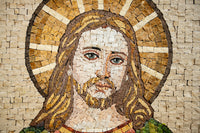 Intricate mosaic artwork depicting a serene face with golden hair and detailed green eyes — a stunning religious representation