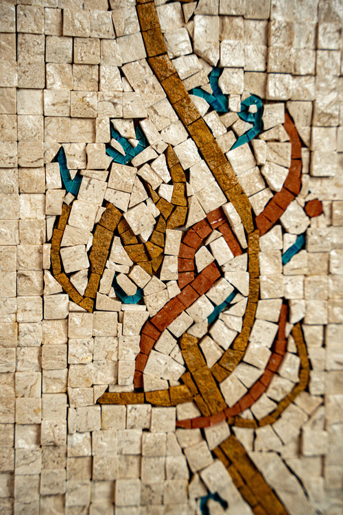 Intricate mosaic artwork featuring vibrant blue and gold patterns against a textured beige background, showcasing detailed craftsmanship.