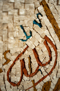 Intricate mosaic artwork featuring textured tiles in earthy tones with vibrant blue highlights—capturing a rich cultural heritage.