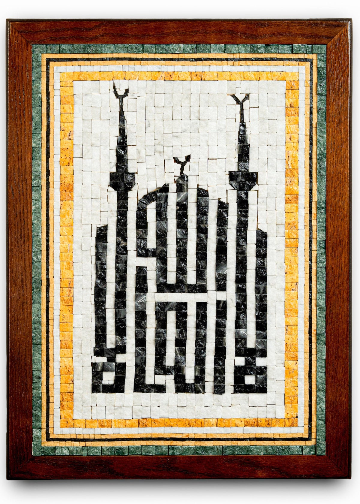 Intricate mosaic wall art featuring a mosque silhouette in black and white — framed in natural wood with vibrant accents.