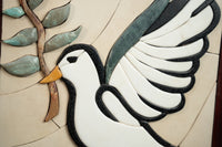 Intricate wall art featuring a white bird with a black wing and a textured olive branch in natural tones — perfect for home decor.