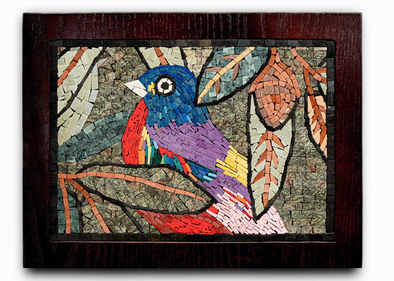 Colorful mosaic artwork featuring a vibrant bird perched on a branch — intricate tile design with natural hues and textures