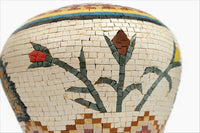 Intricate mosaic vase featuring floral designs in earthy tones — handcrafted with meticulous attention to detail.