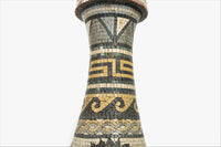 Intricately designed mosaic vase featuring geometric patterns in earthy tones — a stunning decorative piece for any space.