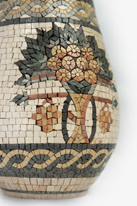 Intricate mosaic vase featuring a floral design in earthy tones—crafted with detailed ceramic tiles for a unique aesthetic.