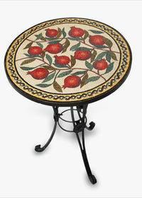 Charming mosaic side table featuring a floral design with red roses and green leaves — elegant wrought iron legs for stability
