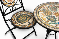 Intricate mosaic table with a matching chair featuring a detailed tree design — crafted from durable materials in vibrant colors