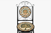 Intricately designed decorative chair featuring a mosaic seat with a tree and floral patterns — black metal frame adds elegance.