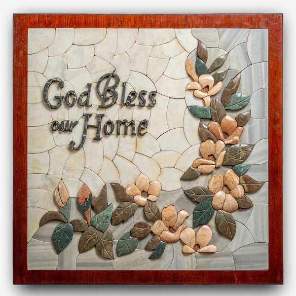 Artistic wall decor featuring a mosaic design with floral elements and the phrase 'God Bless our Home' in elegant lettering