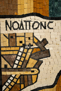 Intricate mosaic artwork featuring earthy tones and geometric patterns — a stunning representation of craftsmanship.