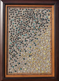Textured wall art featuring a mosaic of colorful glass stones in shades of blue, green, and amber set in a wooden frame