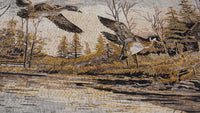 Intricate mosaic artwork depicting flying ducks above a serene landscape with trees and a flowing river — detailed craftsmanship in earthy tones.