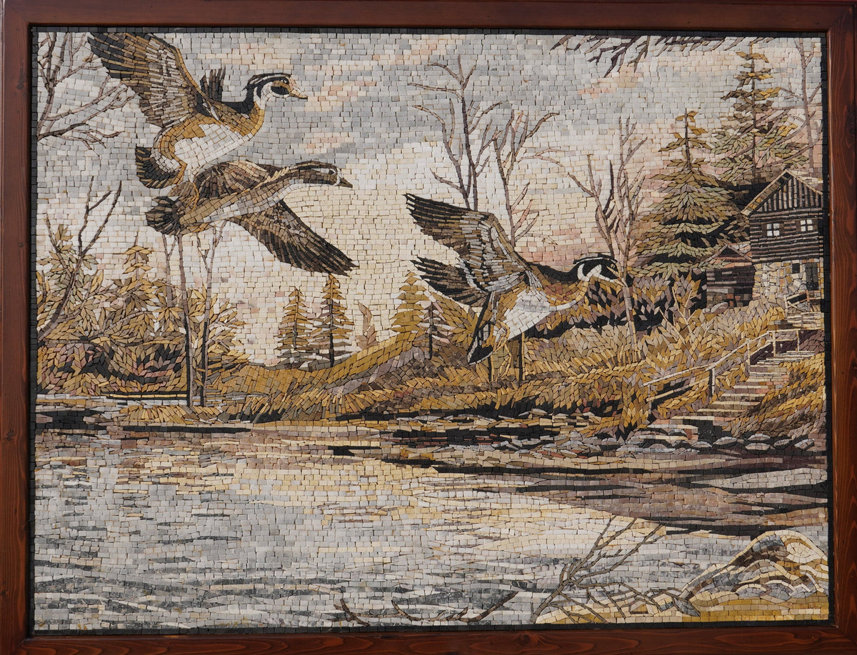 Intricate mosaic artwork depicting flying geese above a serene lake — crafted with detailed natural textures and earthy tones.