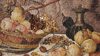 Vibrant mosaic artwork depicting a basket of fruit with intricate detailing — featuring grapes and a dark ceramic jug.