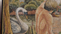 Intricate mosaic artwork featuring a graceful swan beside a serene figure in natural tones, highlighting craftsmanship and detail.