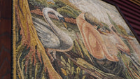 Intricate mosaic artwork featuring a graceful swan and a serene landscape — crafted with vibrant natural stone pieces.