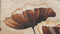 Intricate mosaic wall art featuring large brown and cream floral patterns — a blend of textured tiles creating depth.