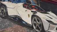 Detailed mosaic featuring a Ferrari sports car in white with sleek lines and striking red accents on the interior