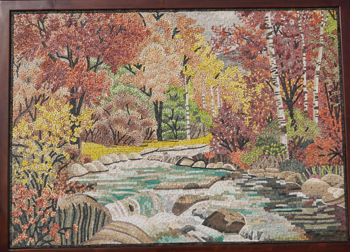 Vivid autumn landscape tapestry featuring a flowing river surrounded by colorful trees and textured rocks in warm hues.