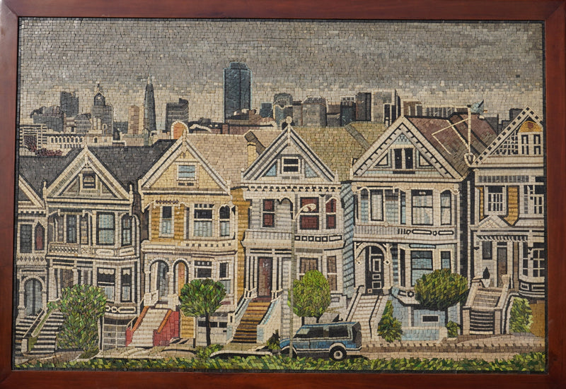 Intricate mosaic artwork depicting Victorian houses in pastel colors — set against a city skyline with a vintage car.