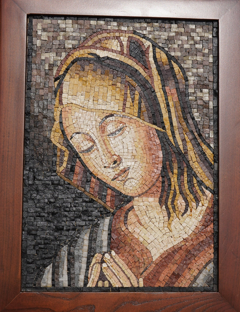 Intricate mosaic art depicting a serene figure with delicate facial features and warm earthy tones framed in rich wood.