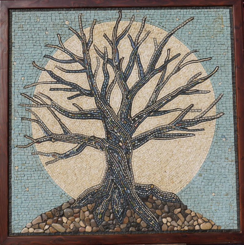 Intricate mosaic artwork depicting a bare tree against a soft blue background — detailed stone and glass elements create depth.