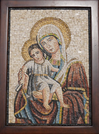 Intricate mosaic art depicting a mother and child in warm earth tones — detailed craftsmanship showcasing textured tiles.
