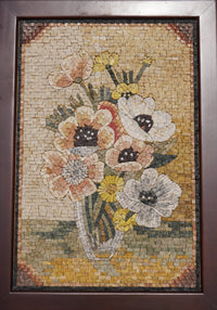 Intricate floral mosaic art featuring a bouquet in a vase — crafted with natural stone tiles in soft pastel hues