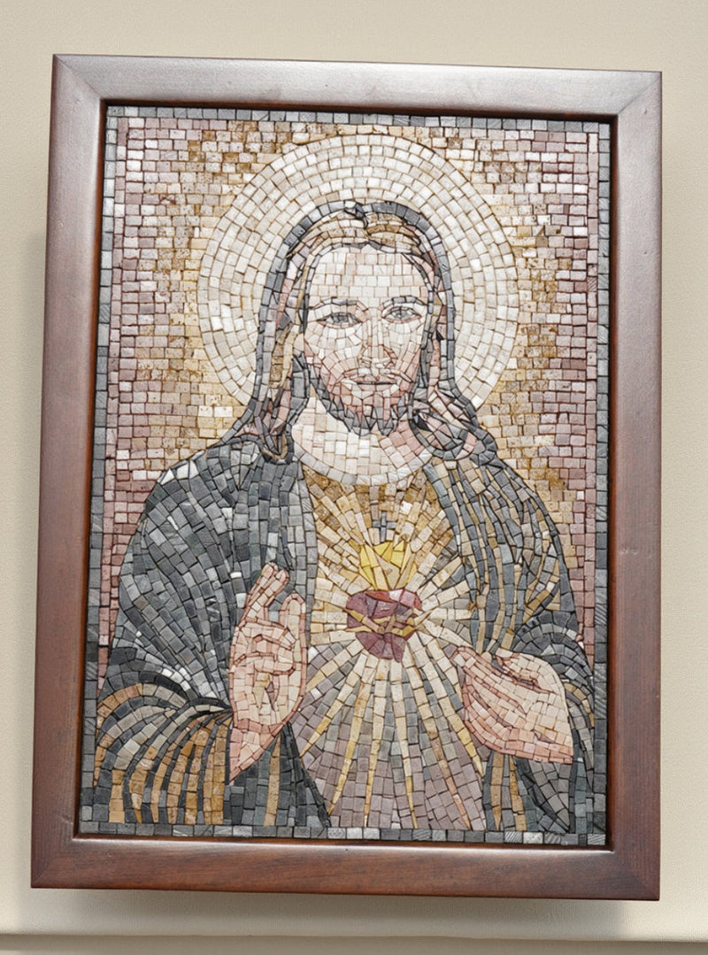 Intricate mosaic artwork depicting a serene figure with a golden heart, framed in rich wood for a classic touch.