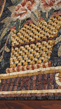 Intricate mosaic wall art featuring a woven basket design in rich earth tones with floral accents and textured details.