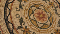 Intricate mosaic table design featuring earthy tones and floral patterns — a blend of artistry and craftsmanship.