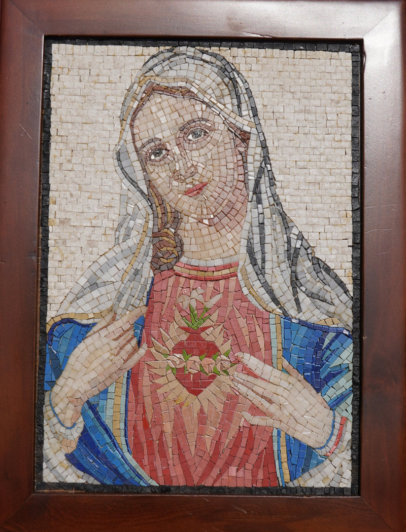 Intricate mosaic art featuring a serene figure with a heart motif, framed in rich wood — vibrant colors and detailed craftsmanship.