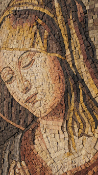 Intricate mosaic artwork depicting a serene woman with flowing hair, showcasing warm earthy tones and textured tiles.