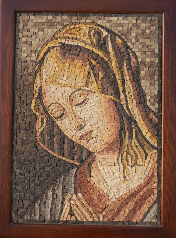 Intricate mosaic artwork depicting a serene figure with flowing hair — crafted from natural stone tiles in warm hues.