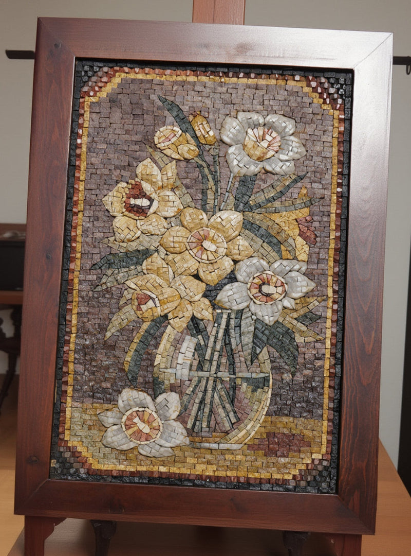 Intricate mosaic wall art featuring a floral arrangement of yellow and white daffodils in a textured wooden frame — vibrant colors enhance the craftsmanship.