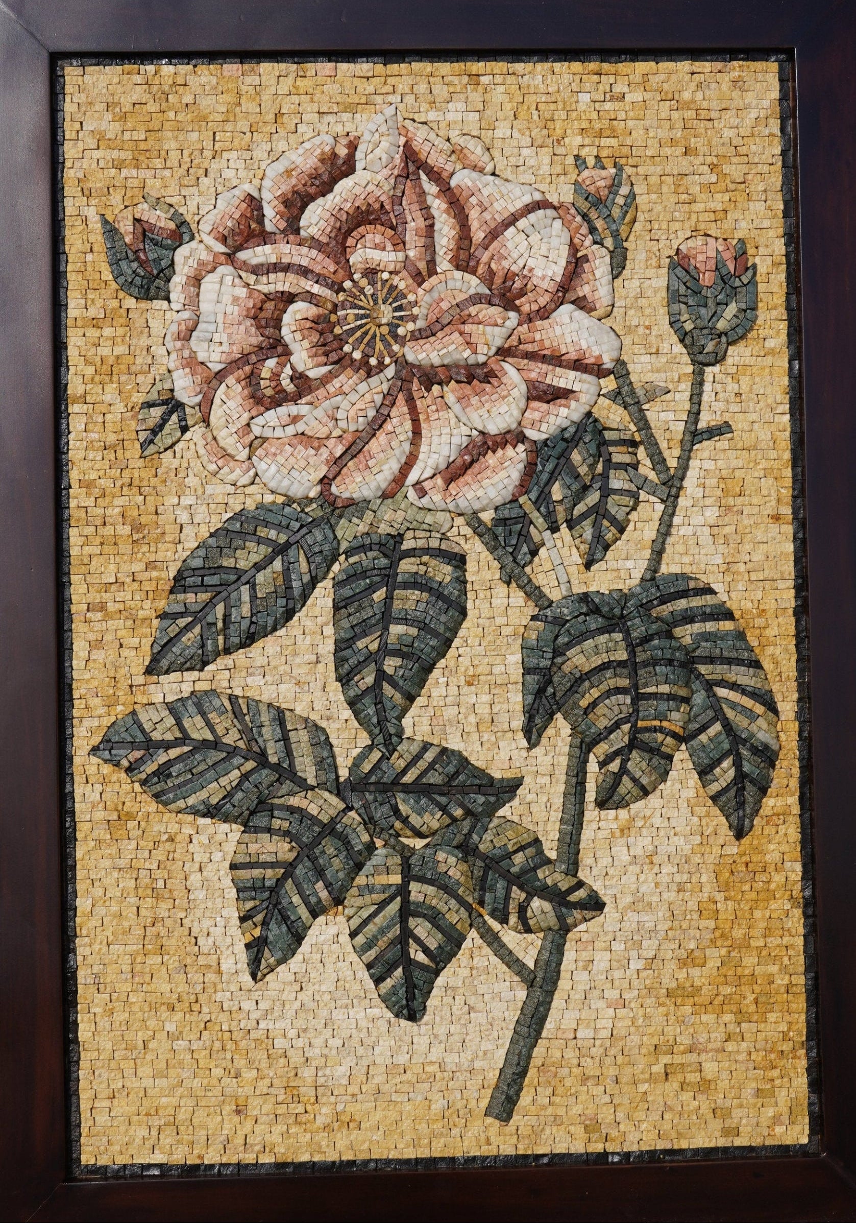 Decorative wall art with a floral design on a wooden easel.