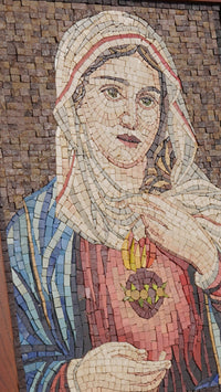 Intricate mosaic artwork featuring a serene woman draped in a blue robe and white headscarf, with vibrant colors enhancing her expression.